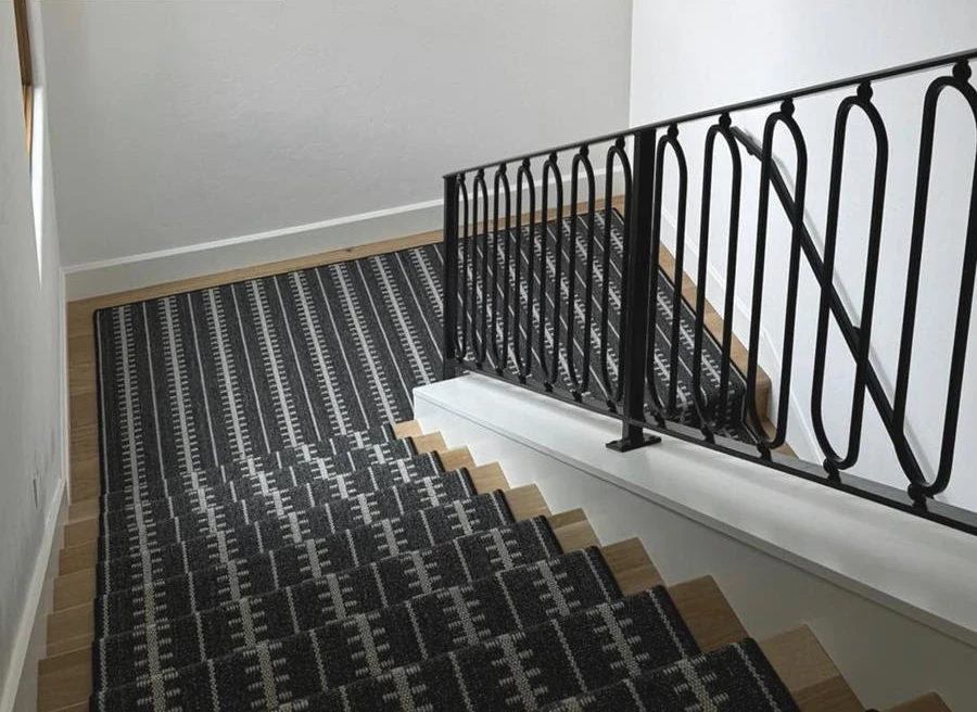 geometric patterned carpet on stairs